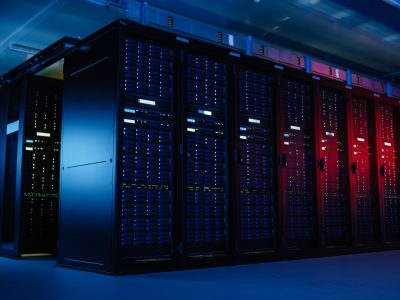 Shot,Of,Data,Center,With,Multiple,Rows,Of,Fully,Operational